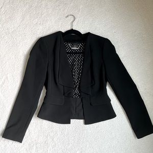 Black blazer with polka dot interior